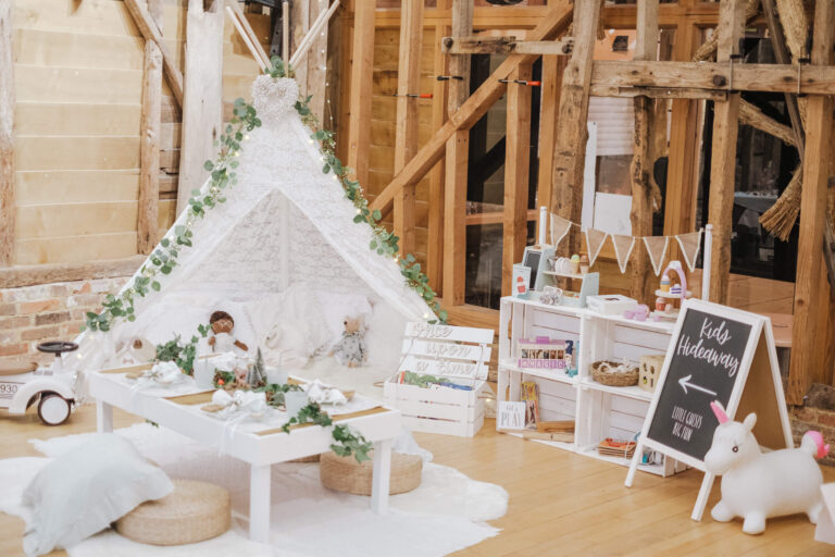 Wedding play corner with teepee, table and crates