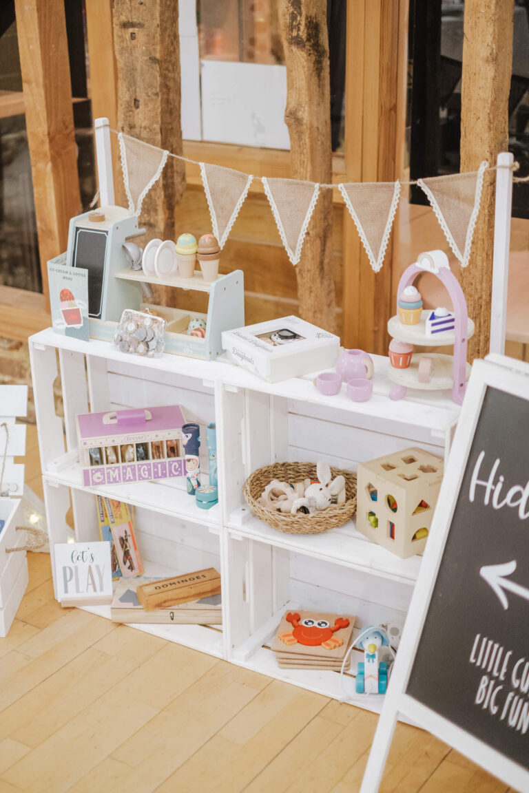Activity crate shelves with bunting at an event