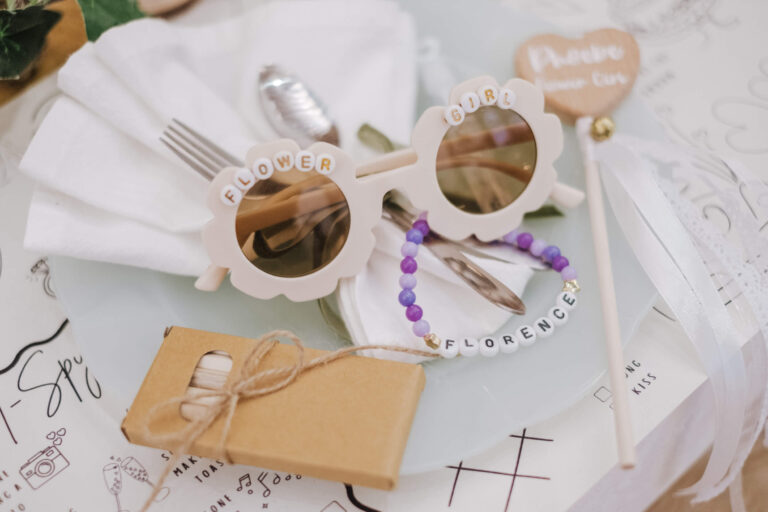 Novelty sunglasses party favour at a place setting