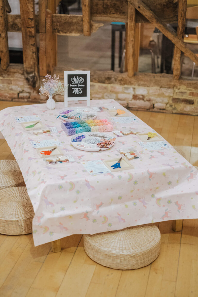 Craft table spread with activities for children