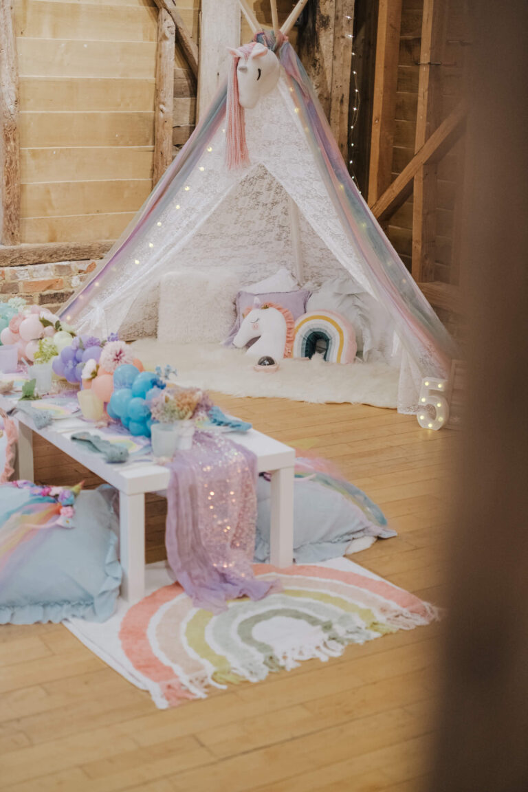 Sleepover teepee with cushions and unicorn styling