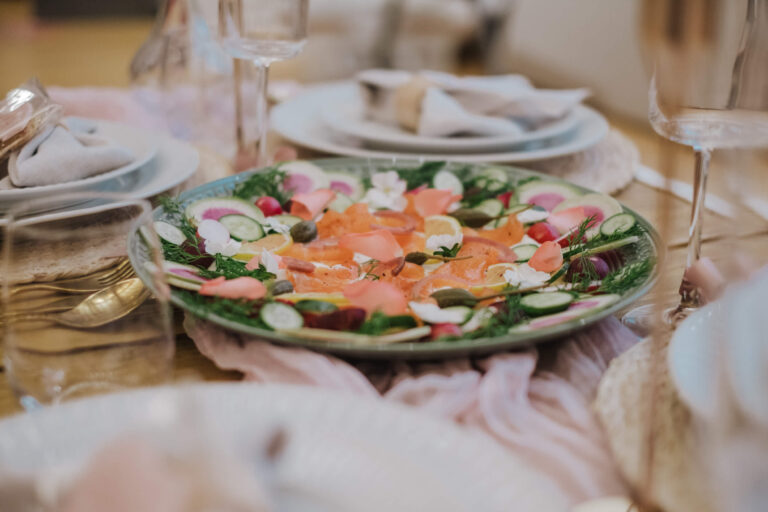 Luxe tablescape detail with gold cutlery and floral styling
