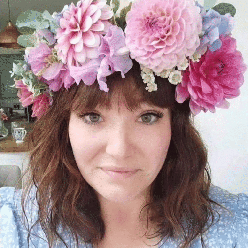Laura, founder of Violet Hummingbird Events, wearing a fresh flower crown